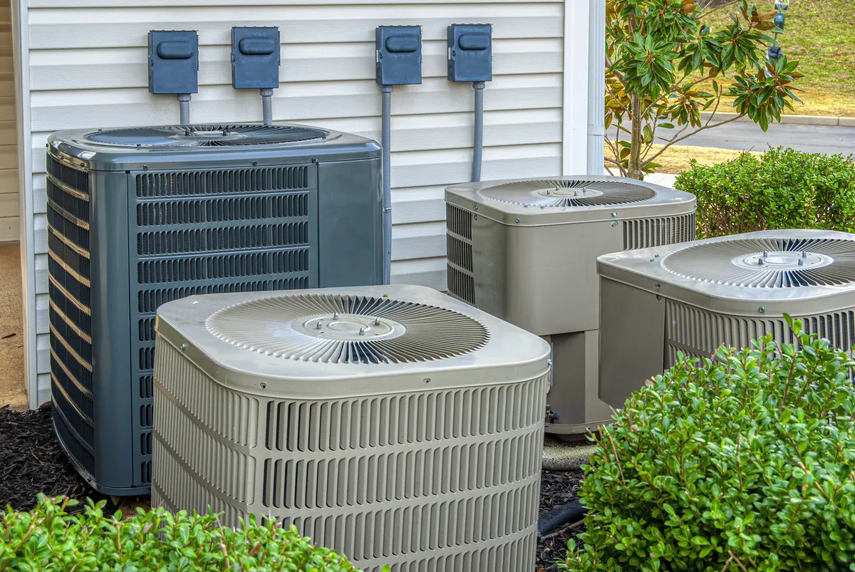 Pro-Tech comfort advisor reviewing heating and cooling options for an Ada Township home