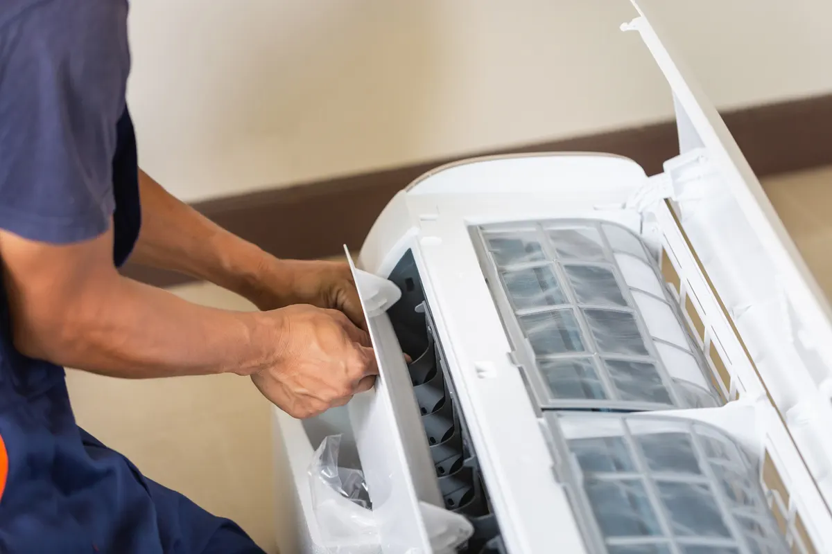 Pro-Tech technician performing furnace diagnostics of the kind common in Rockford, MI homes